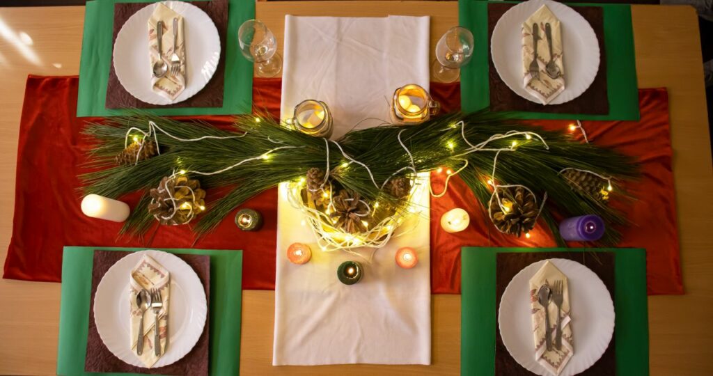  stunning Christmas dining table with pine branches and colorful candles