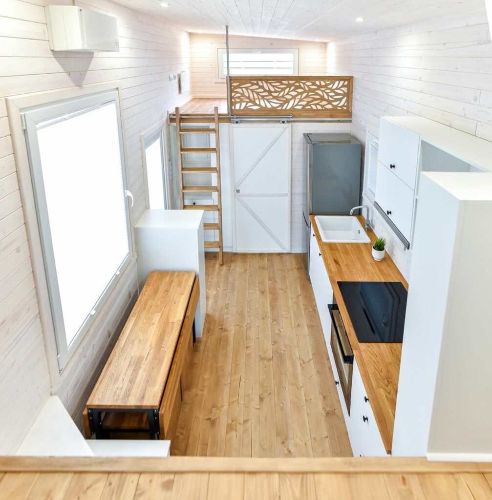 Inside a Tiny House With a Pop-Out Deck - Alpha Tiny Home by New