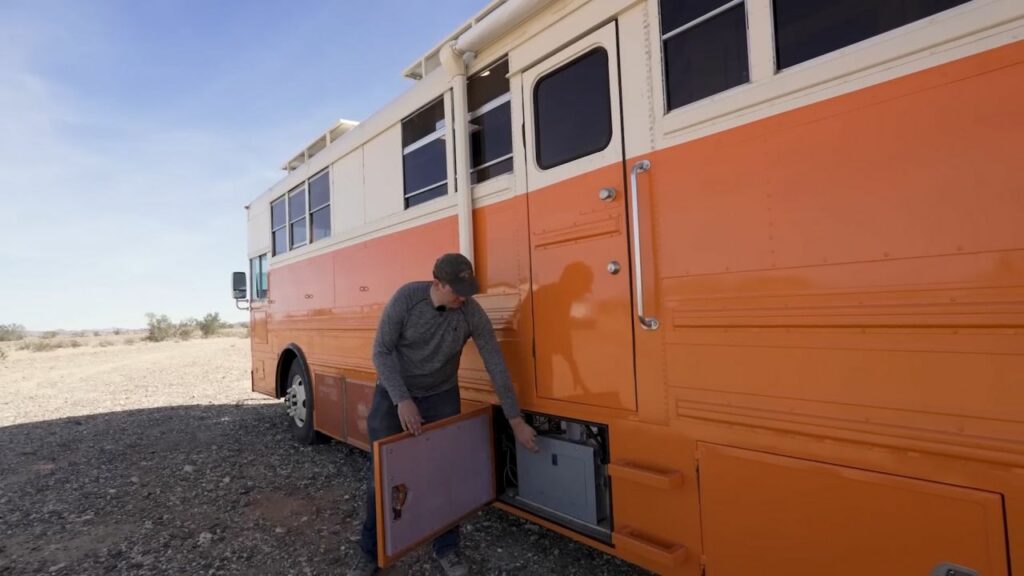 Couple Turns 40-ft School Bus into Luxury RV with Large Pantry in Kitchen