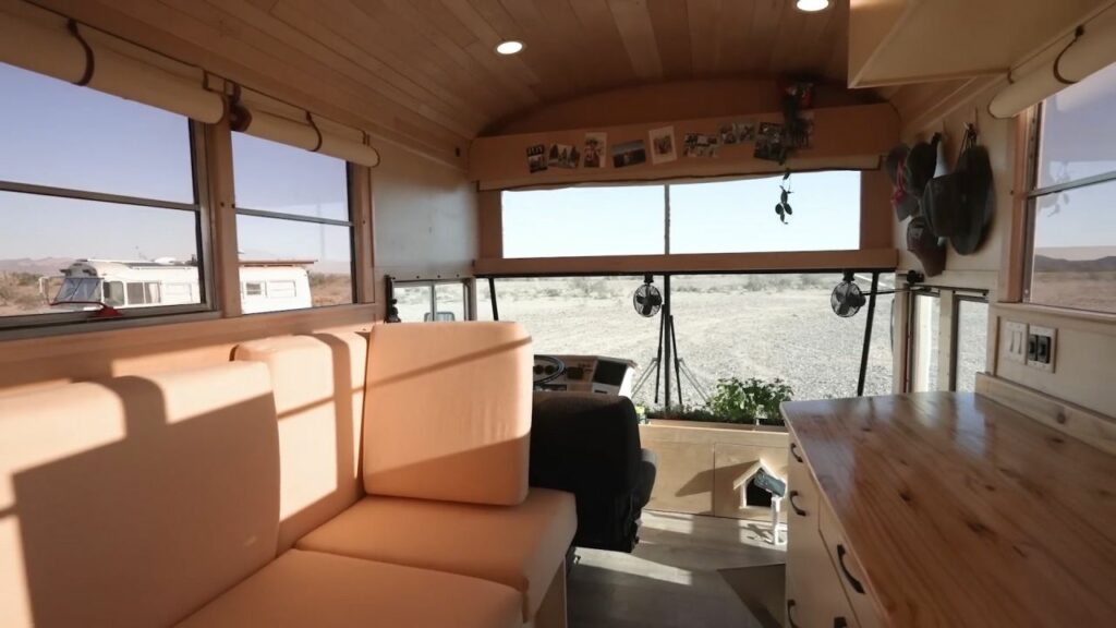 Couple Turns 40-ft School Bus into Luxury RV with Large Pantry in Kitchen