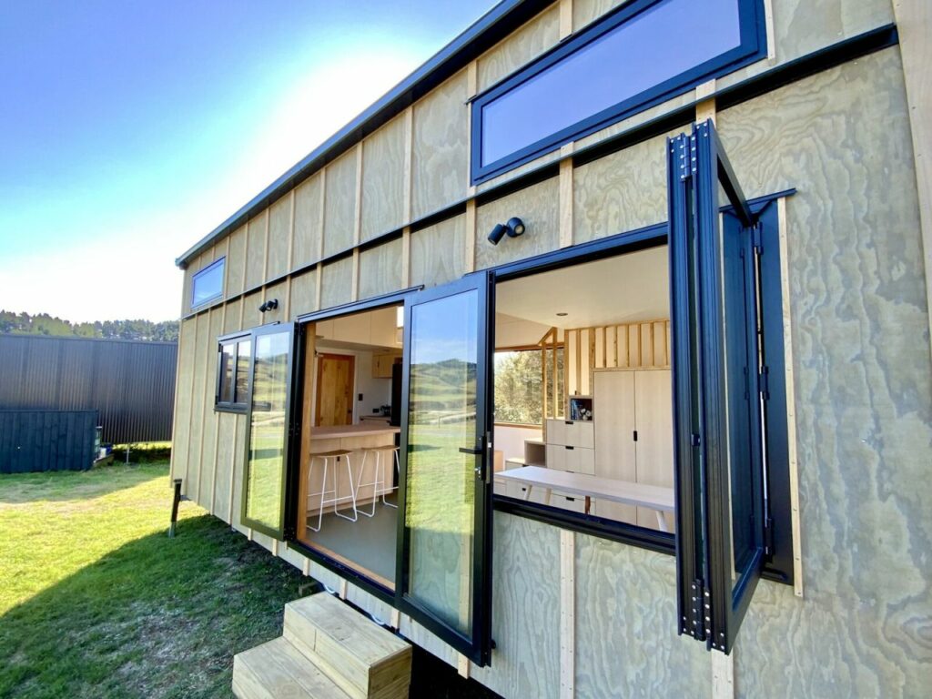 This Tiny House has Two Staircases with Storage Drawers