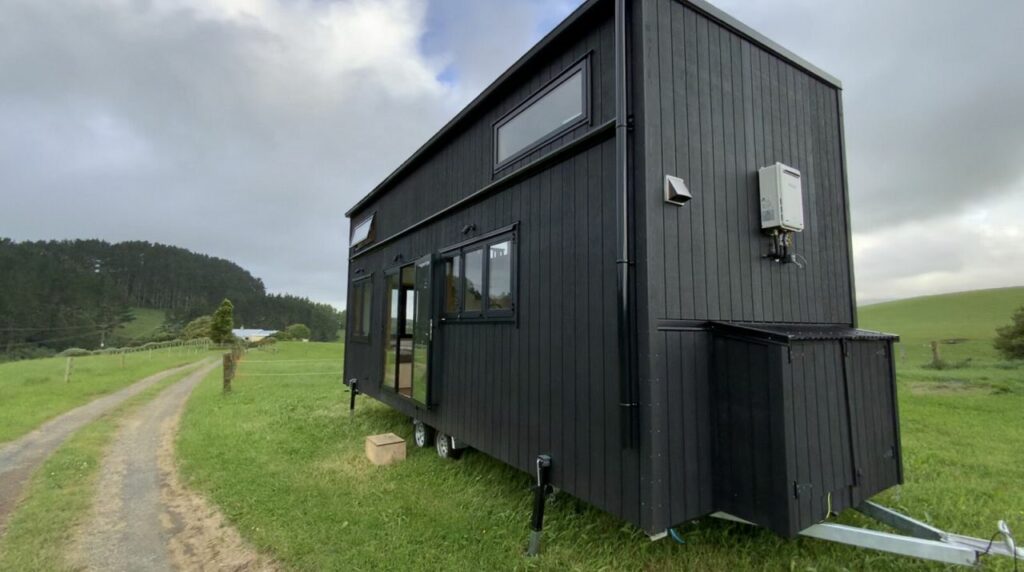 This Tiny House has Two Staircases with Storage Drawers