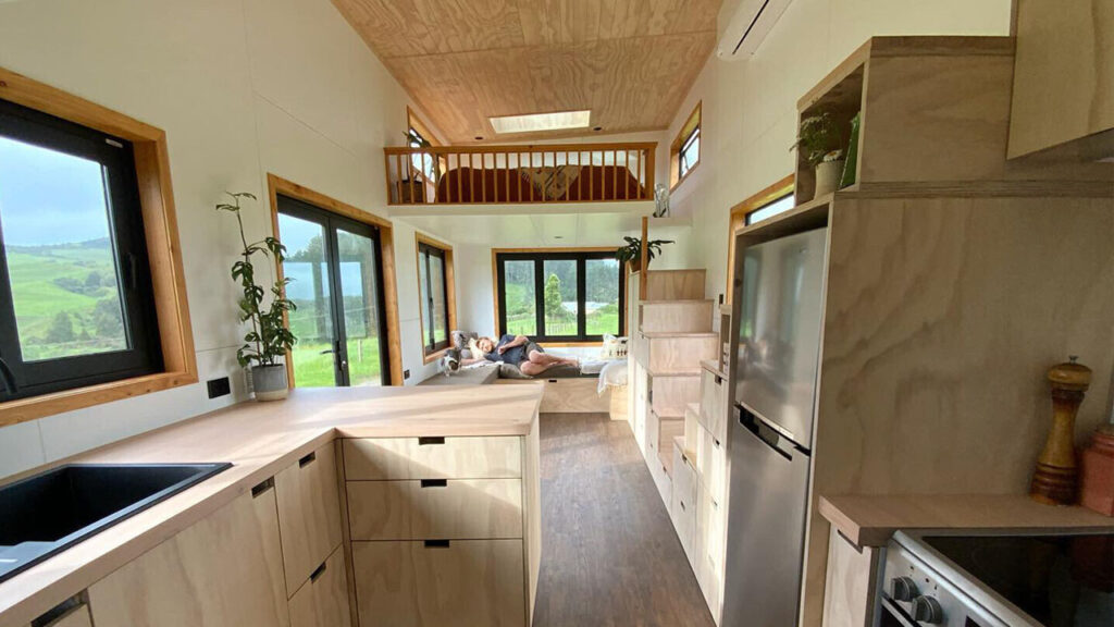 This Tiny House has Two Staircases with Storage Drawers