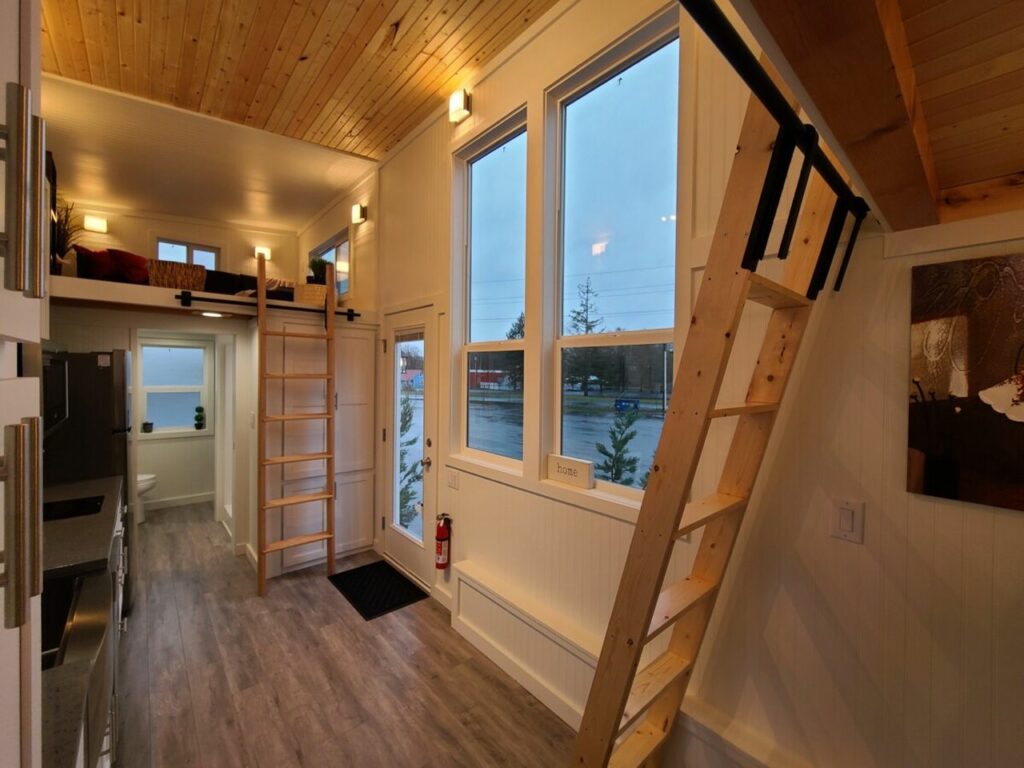 Sherloak Homes Tiny House has Secret Sunroom in 2-Loft Design