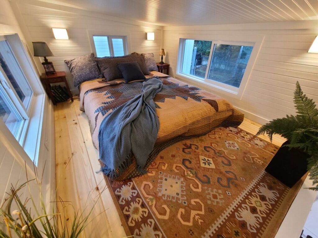 Sherloak Homes Tiny House has Secret Sunroom in 2-Loft Design