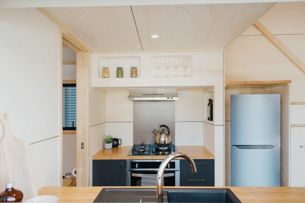 Home Haven's kitchen by Build Tiny