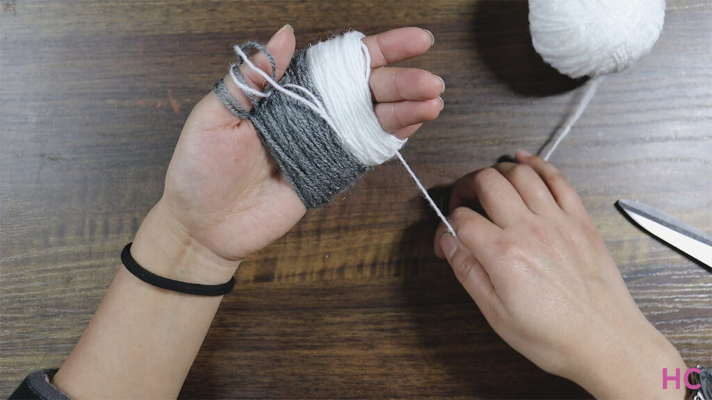 Make-skeins-from-gray-and-white-yarn