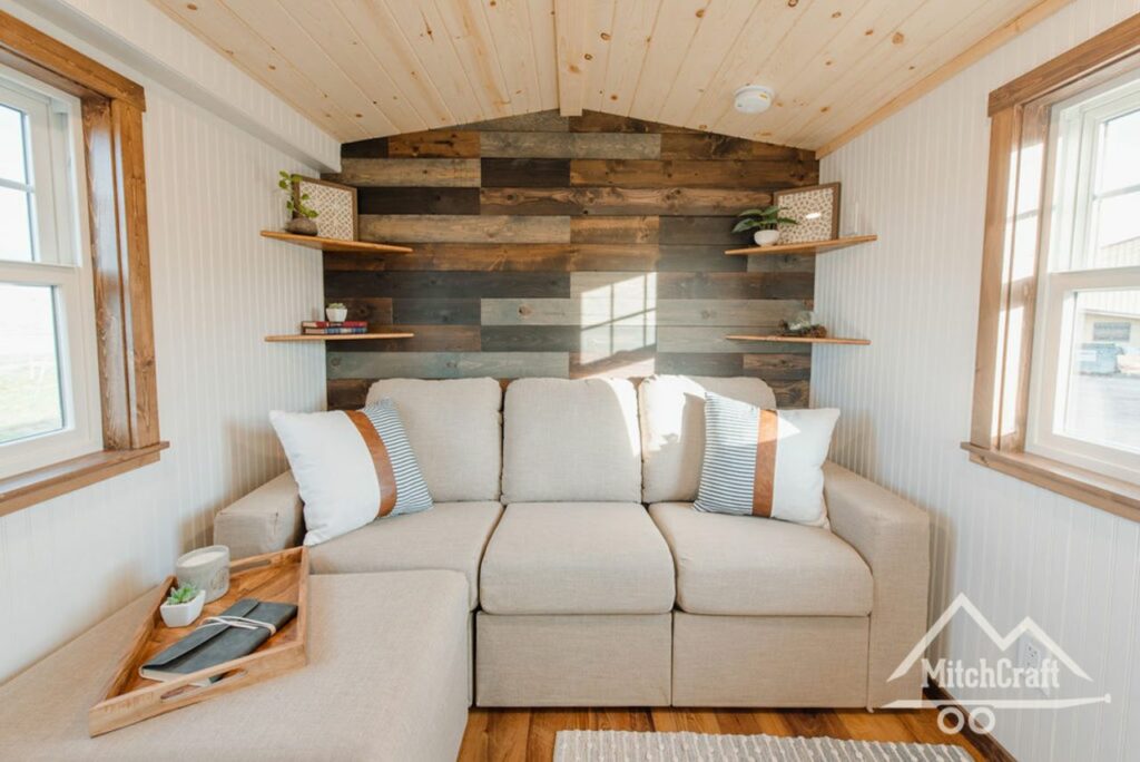 Summer’s 32′ x 8′ Tiny Home living room by MitchCraft Tiny Homes