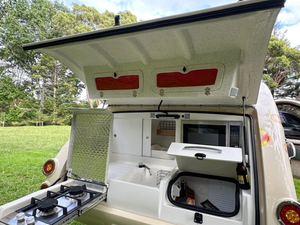 Three cooking options in galley of teardrop trailer