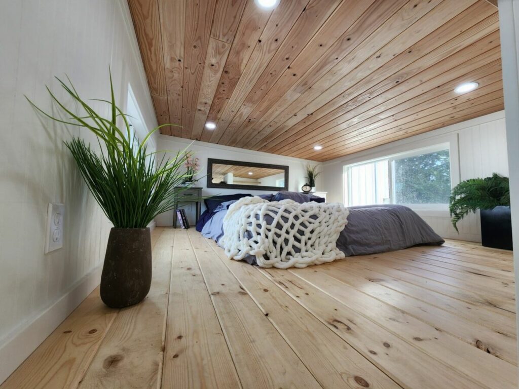 Bedroom of Yukon tiny house by Tiny Mountain Houses