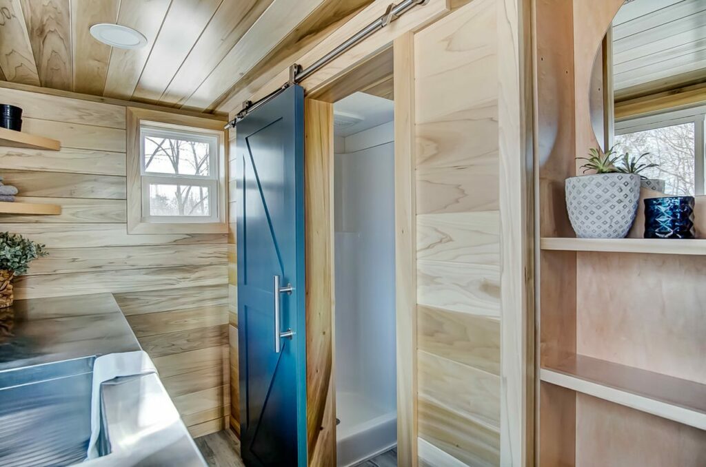 Buxton-Tiny-Home-Barn Door to Bathroom