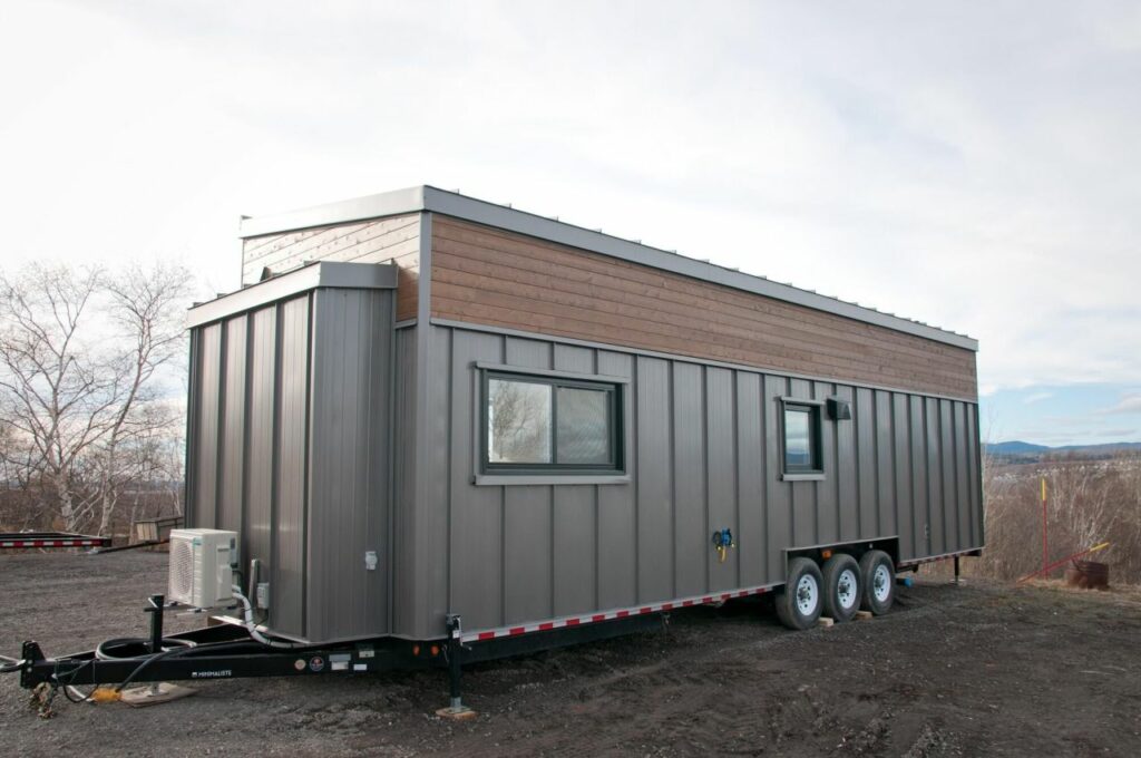 Charme Tiny House has Three Bedrooms to Sleep a Family of Six 