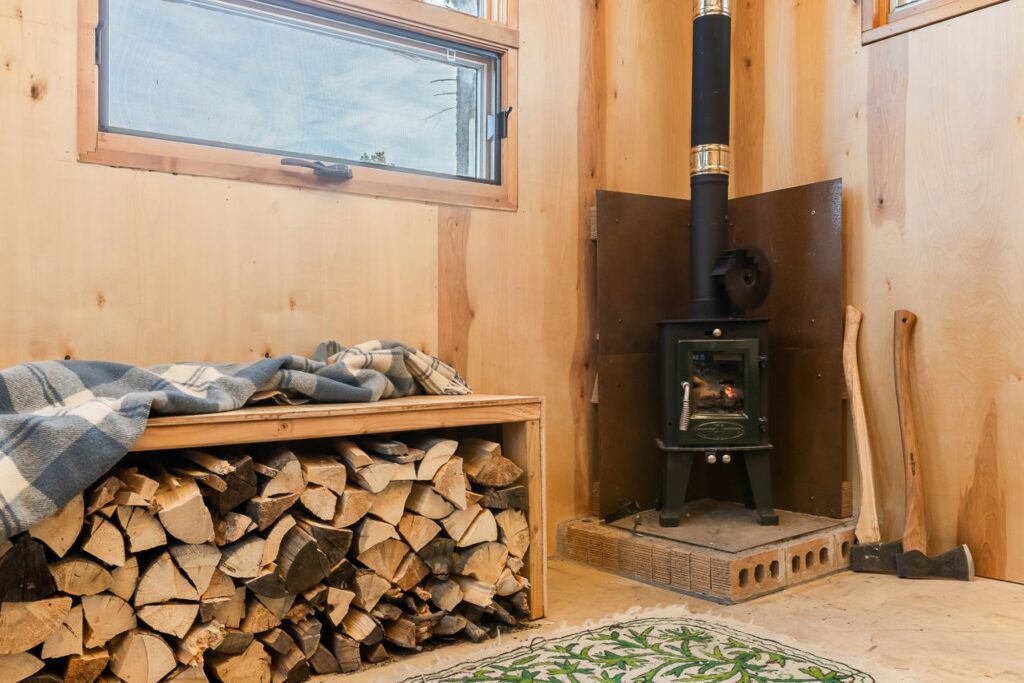 Magnolia-Tiny-Cabin-by-Michael-Quirk-Fireplace