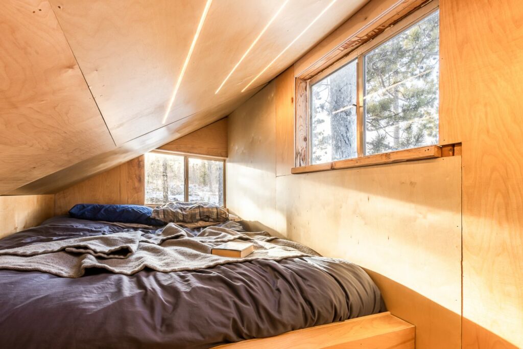 Magnolia-Tiny-Cabin-by-Michael-Quirk-Loft Bedroom