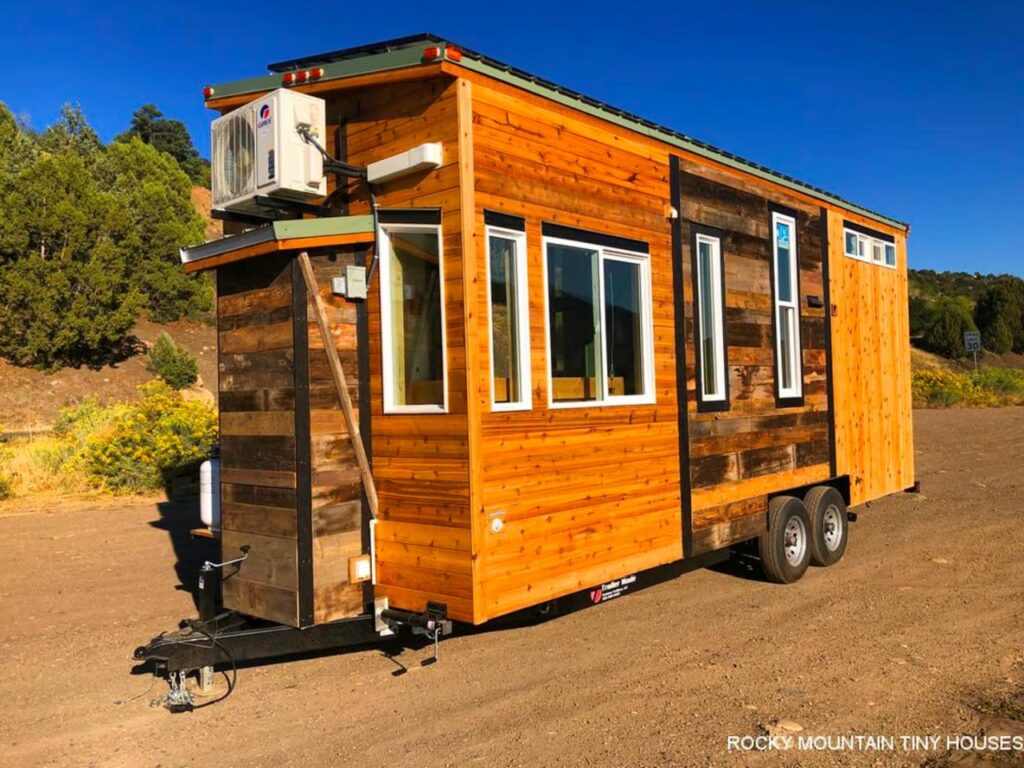 This Rustic Tiny House Features a Drop Down Bed and a Dog Kennel