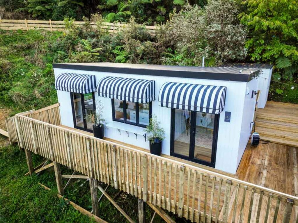 Tiny Home With Magical Glasshouse Dining Room-1