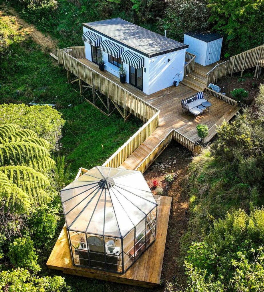 Tiny Home With Magical Glasshouse Dining Room