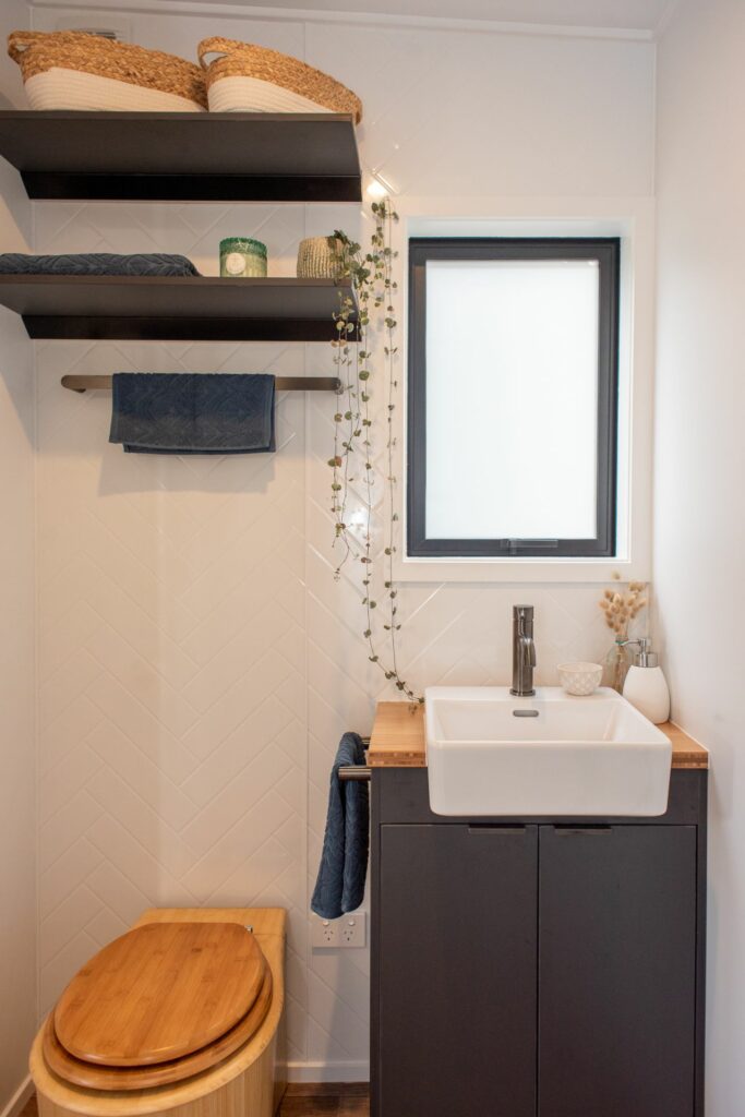 Glider tiny house bathroom by Build Tiny