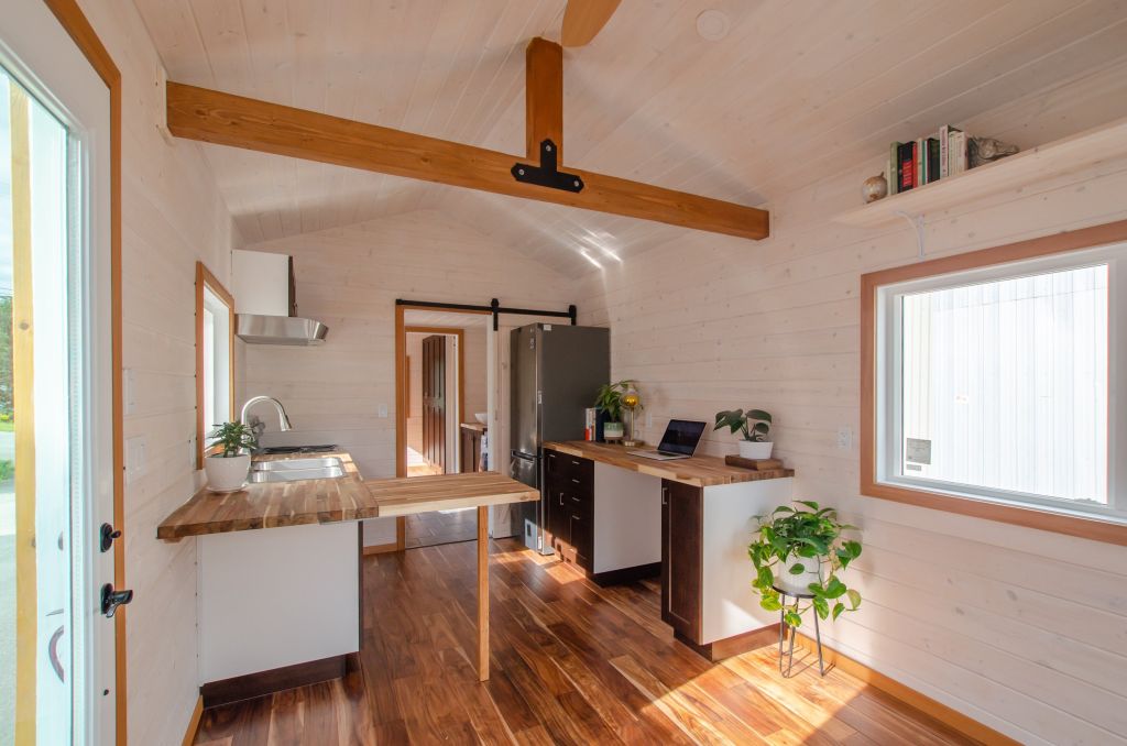 The Garry Oak tiny house kitchen and workspace by Rewild Homes