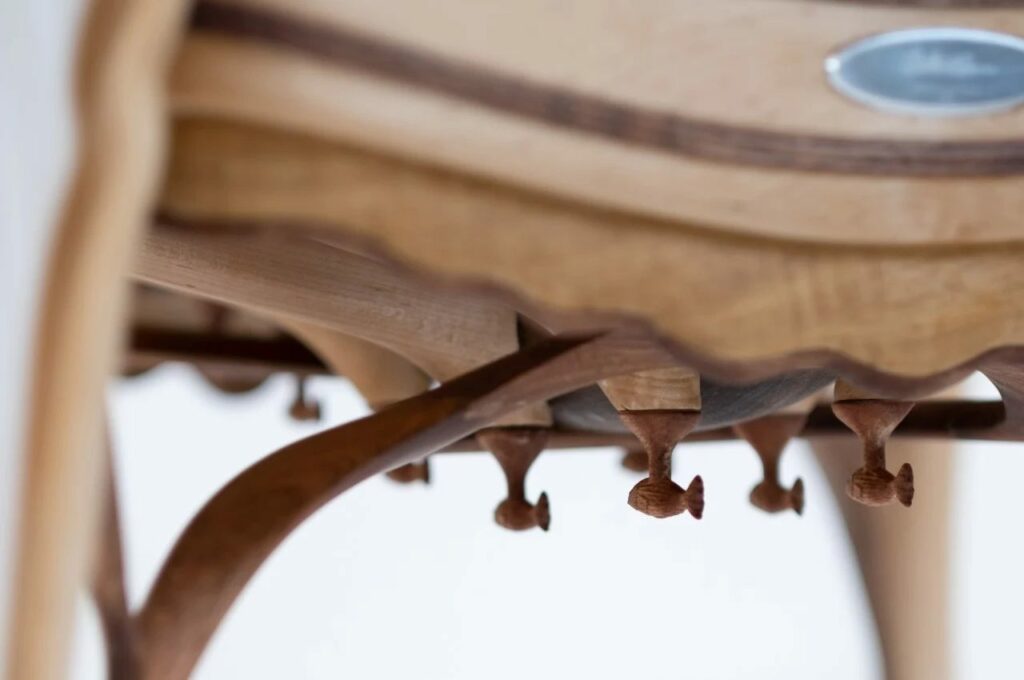 COSMOS-Chair-wooden fish on underside