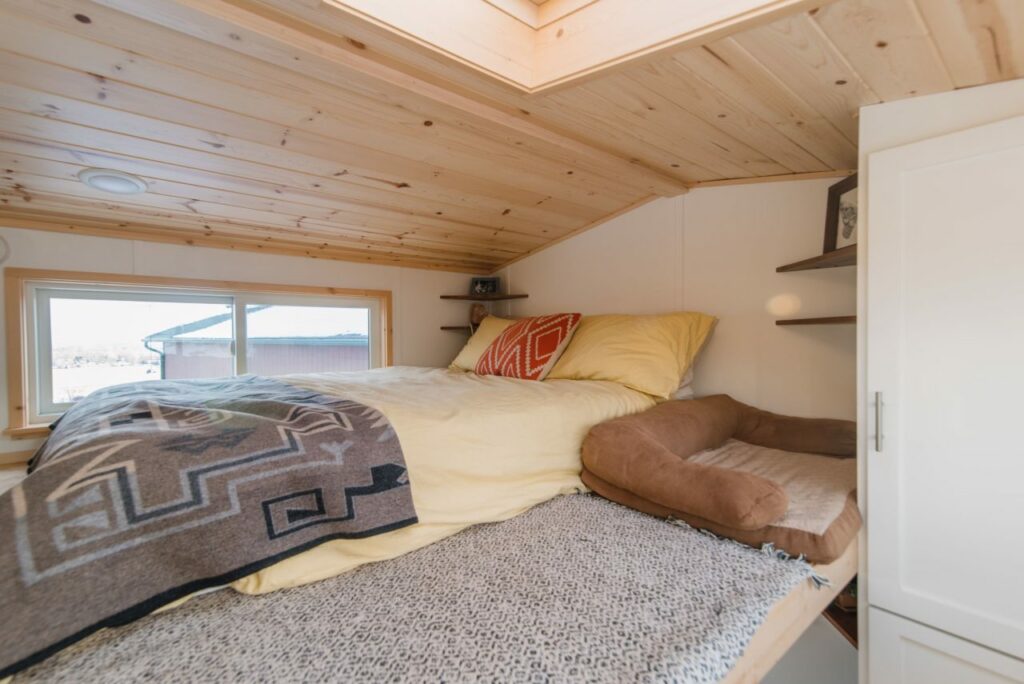 Carrie-and-Dan’s-Tiny-House-Sleeping loft with skylight and standing landing