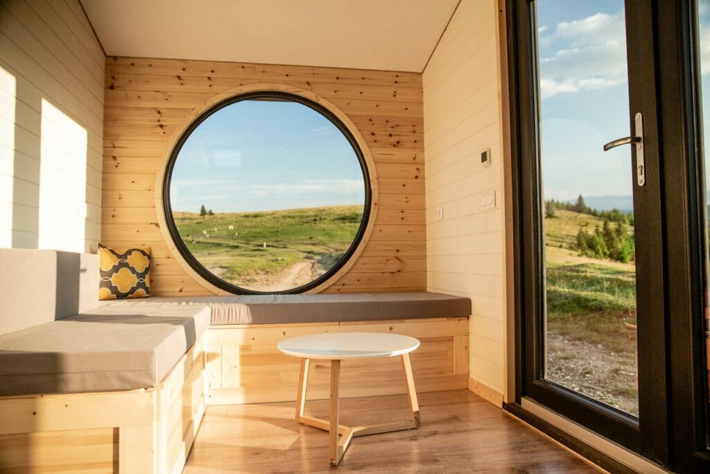 Riverside-Tiny-House-Porthole window in the living room