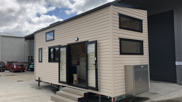 Daisy Vera Tiny House Features Stained Glass Window