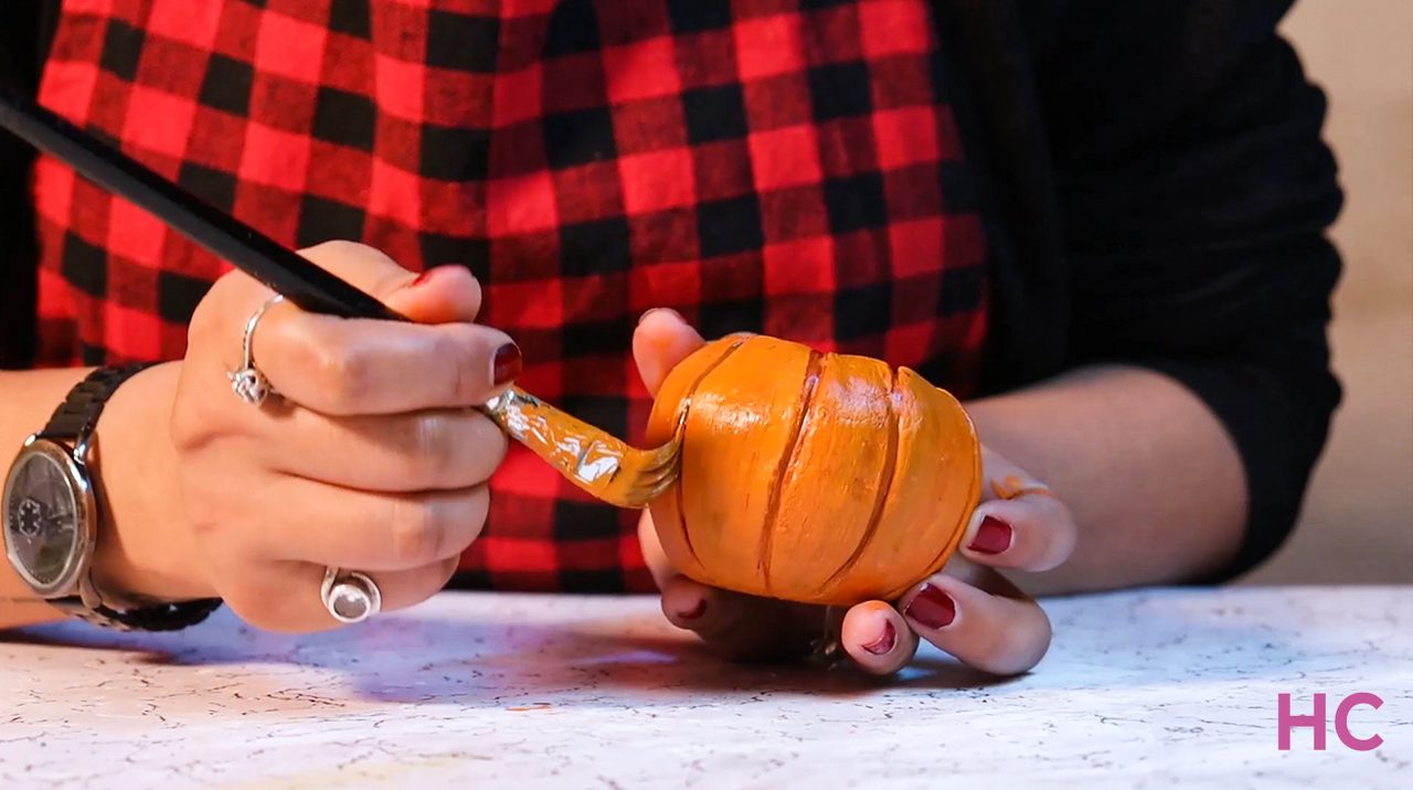 DIY Pumpkin Candle Holder - Add brown lines inside the indentations