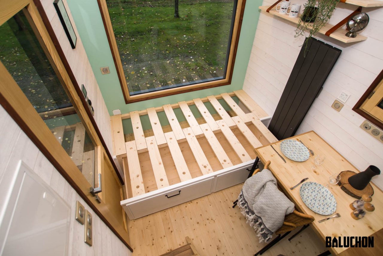 Extendable bed in Living Room of Le Château Ambulant tiny house -3