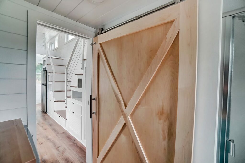 Gallaway Tiny House - Barn door in bathroom