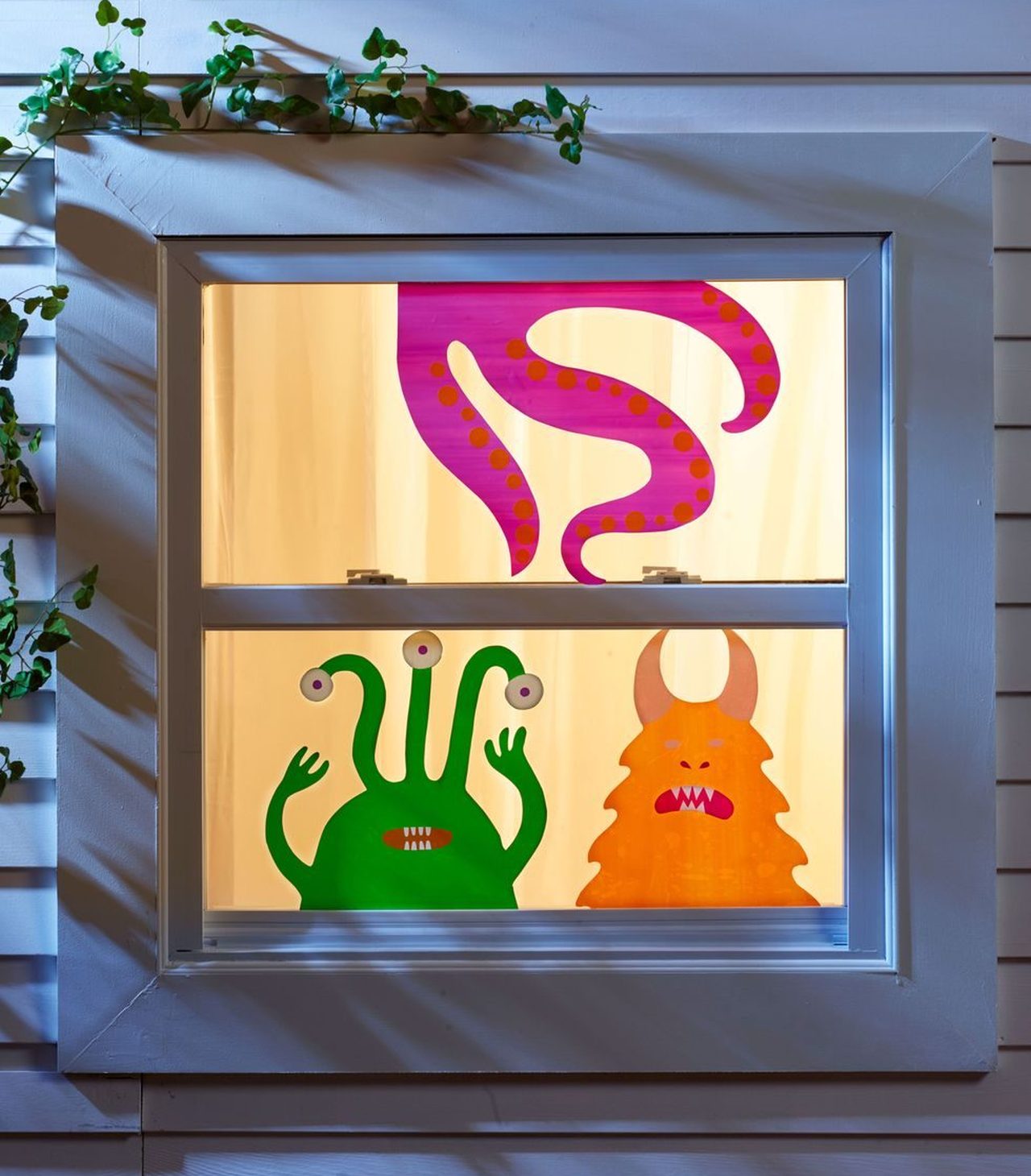 Halloween window decor ideas - painted monsters