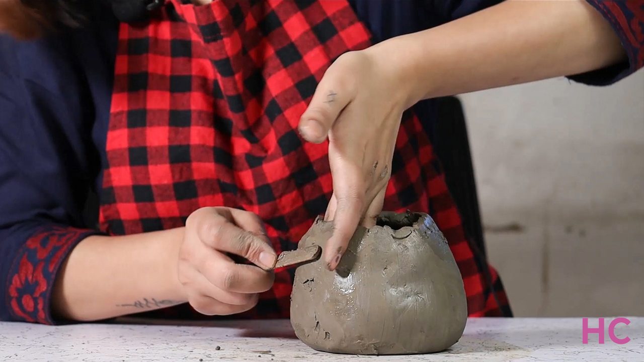 Jack-o-lantern clay candle holder - ease out irregularities