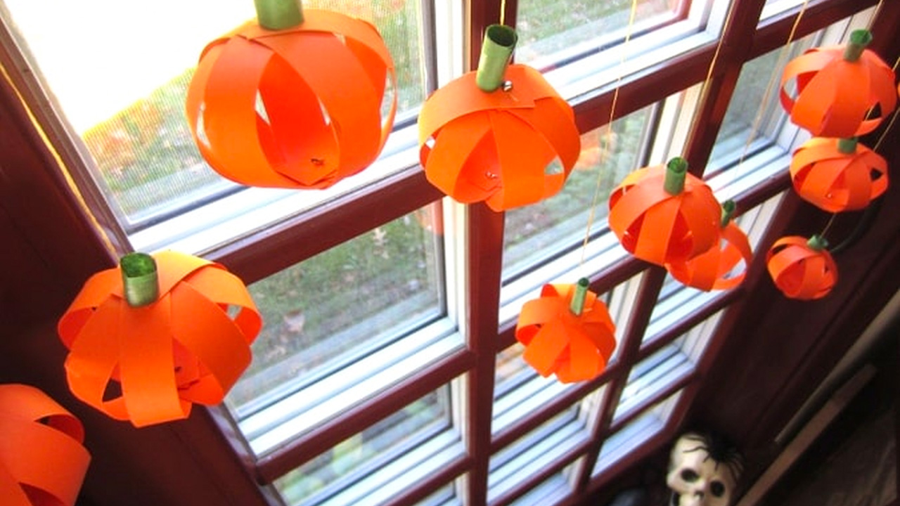 Paper pumpkin garland for halloween window decoration