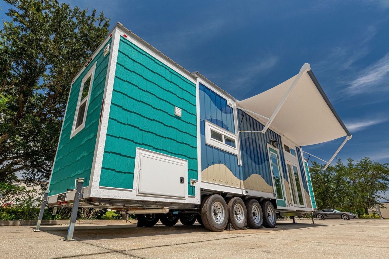 Wave tiny house by Movable Roots Tiny Homes