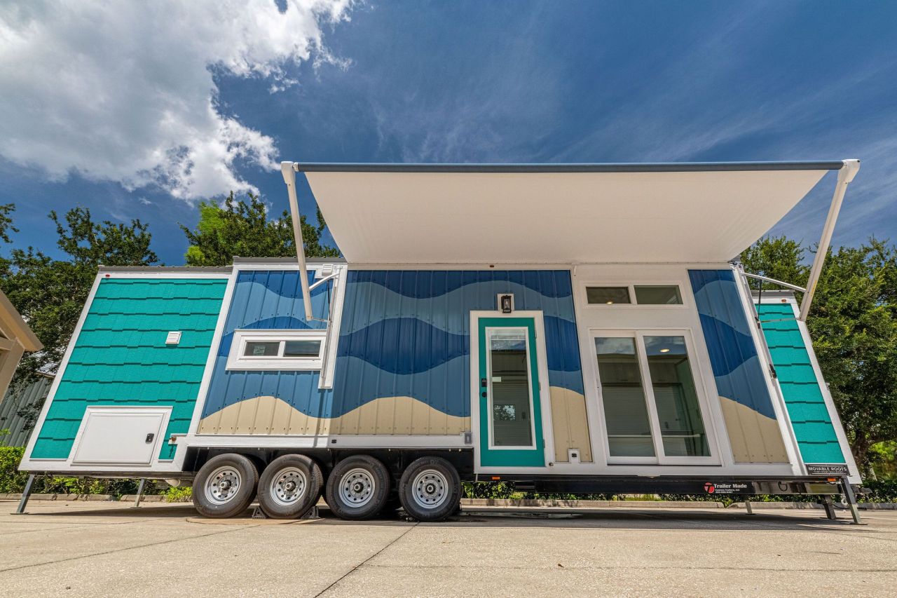 Wave tiny house by Movable Roots Tiny Homes