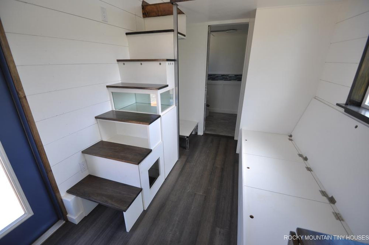 Ad Astra Tiny House-integrated storage and sofa