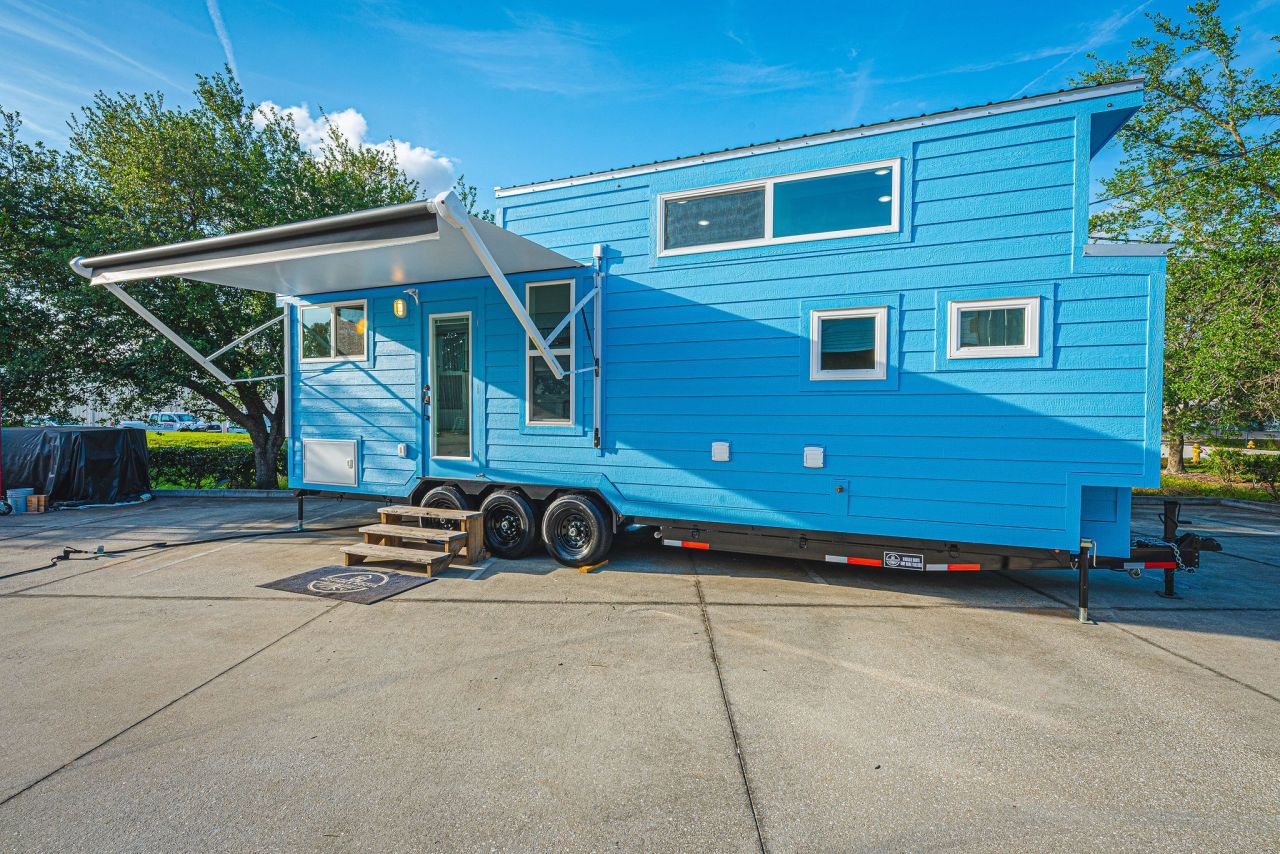 Cavin tiny house on wheels by Movable Roots Tiny Homes