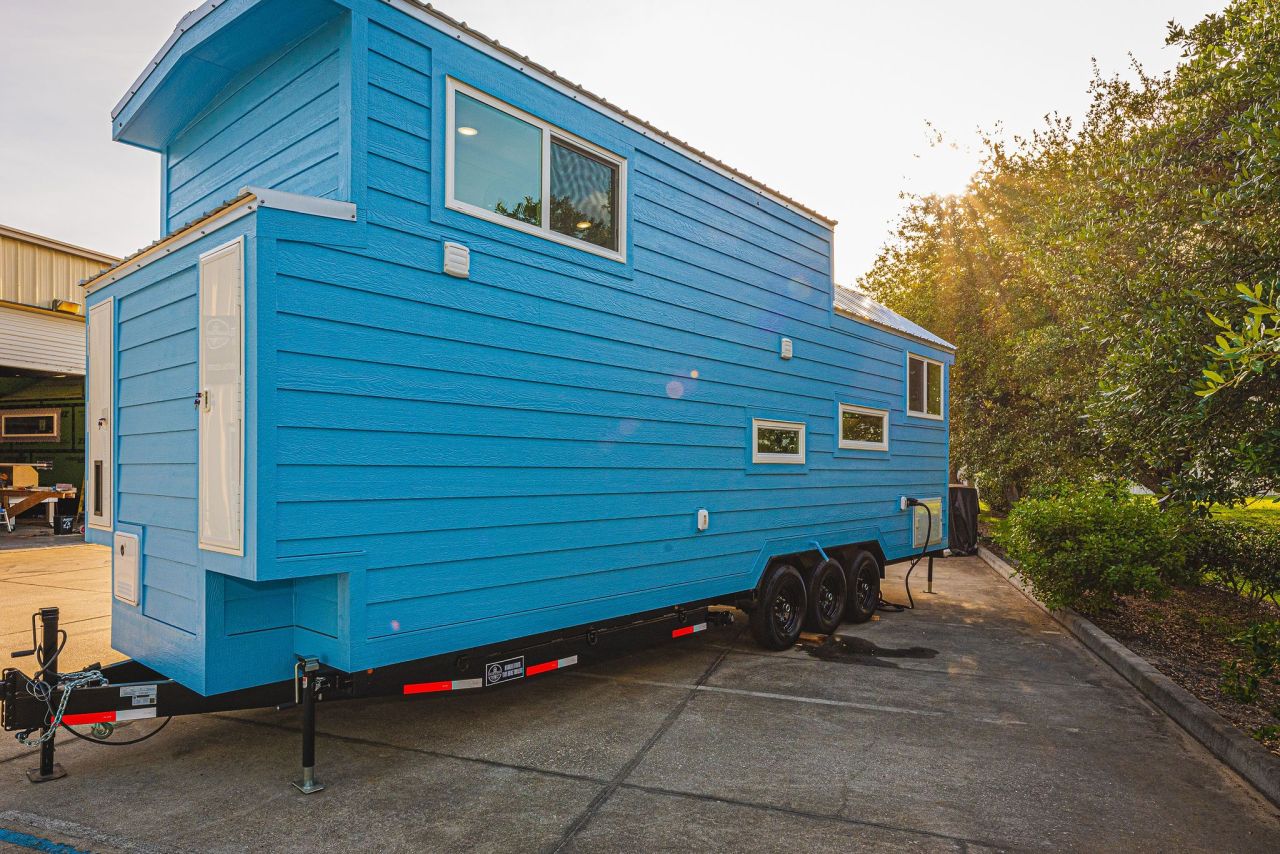 Cavin tiny house on wheels by Movable Roots Tiny Homes