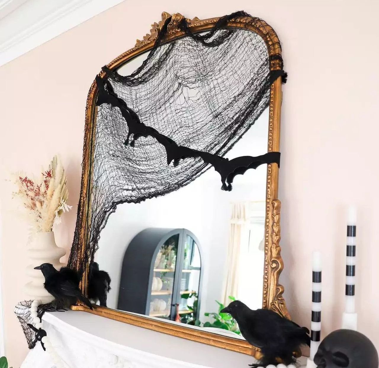 Creepy mesh fabric over a mirror
