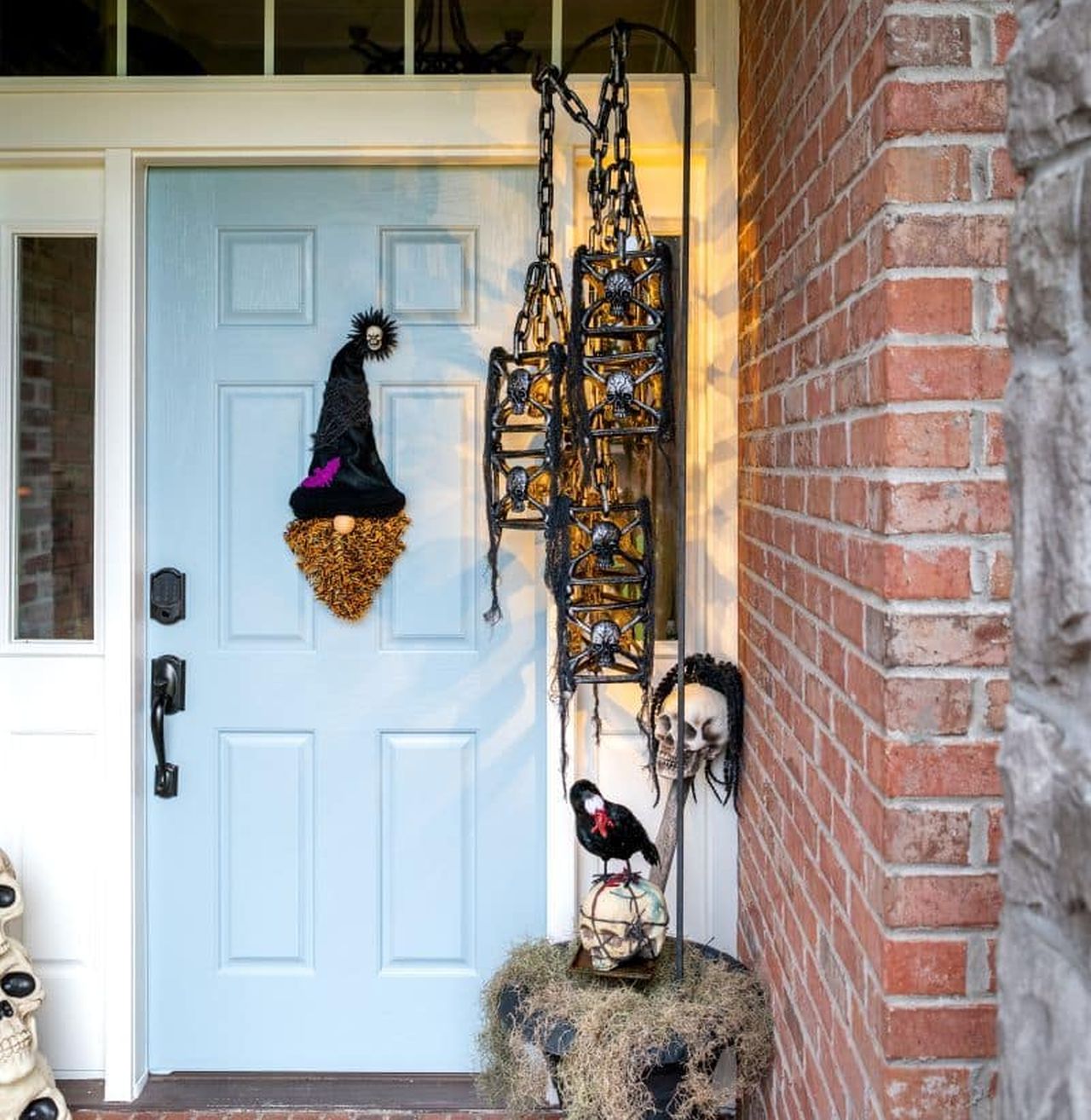 Halloween front door decor with hanging lights