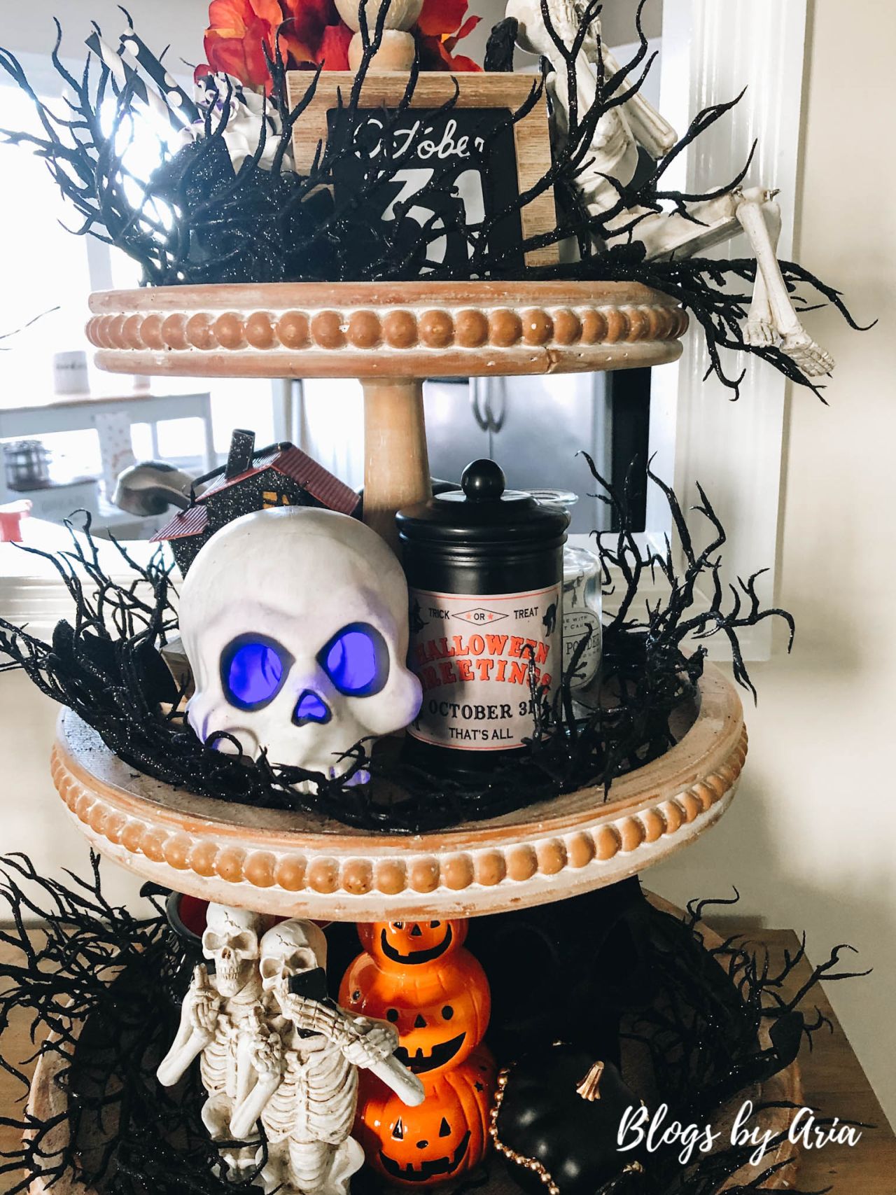 A multi-level display featuring an array of skulls and skeletons