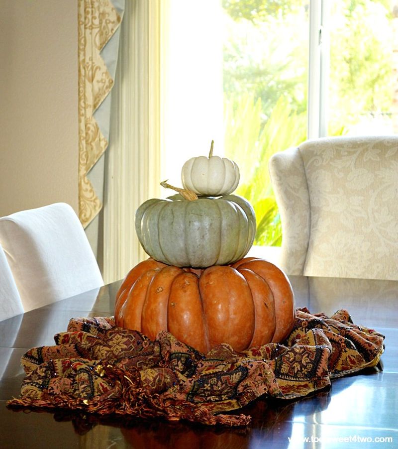 Place a stack of pumpkins on your fireplace hearth or anywhere you like