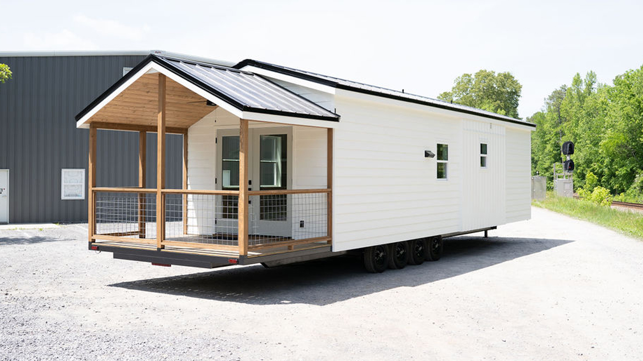 Cumberland Tiny House Boasts a Gigantic Porch & Workstation