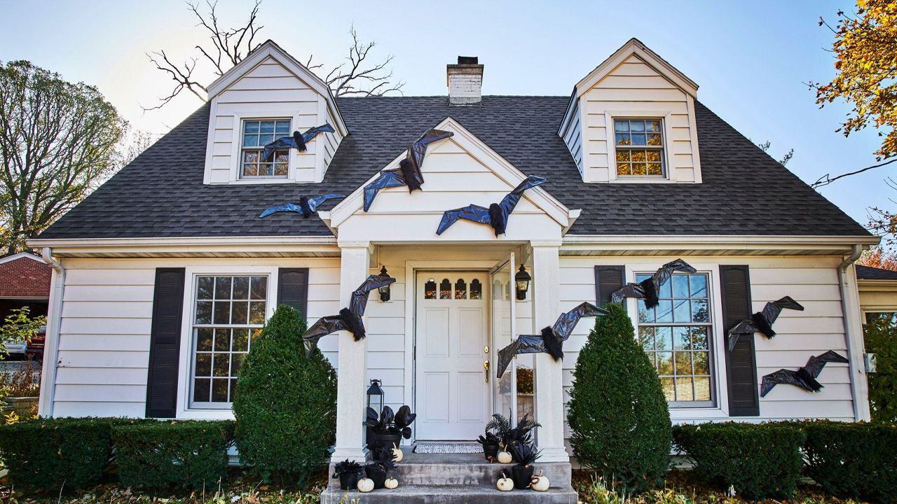 DIY Outdoor Halloween Decorations - Oversized Bat Infestation