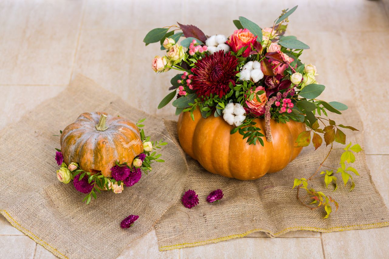 Give your home a seasonal touch up with this pumpkin and flower decoration