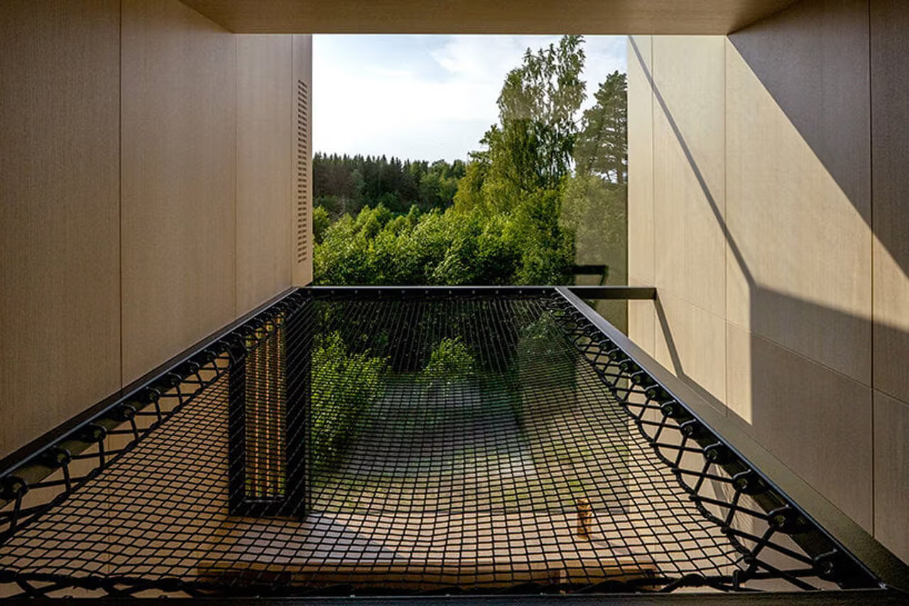 Piil Treehouse by Arsenit swings Hammock Mezzanine mid-air