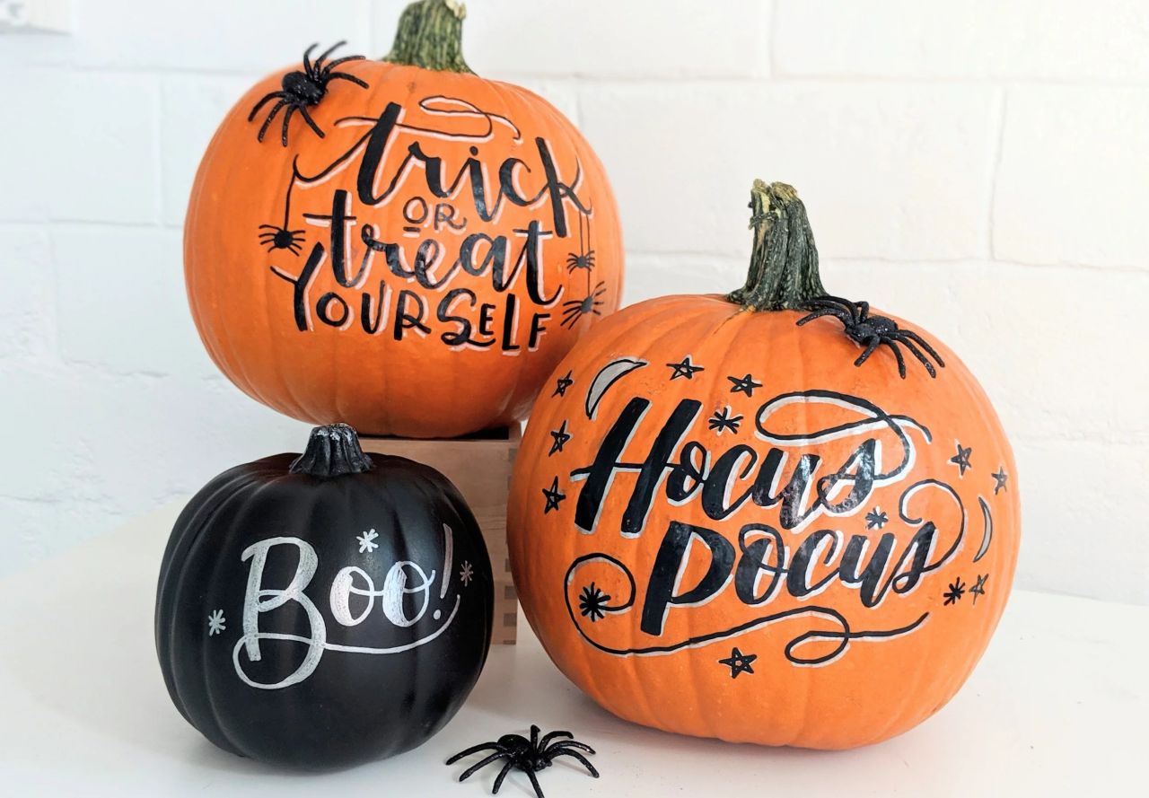 Spooky words on pumpkins for the chilling atmosphere