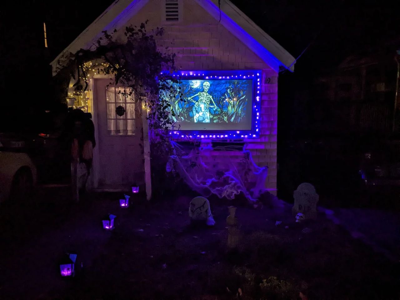 Tiny House Halloween Decor Ideas-projector display