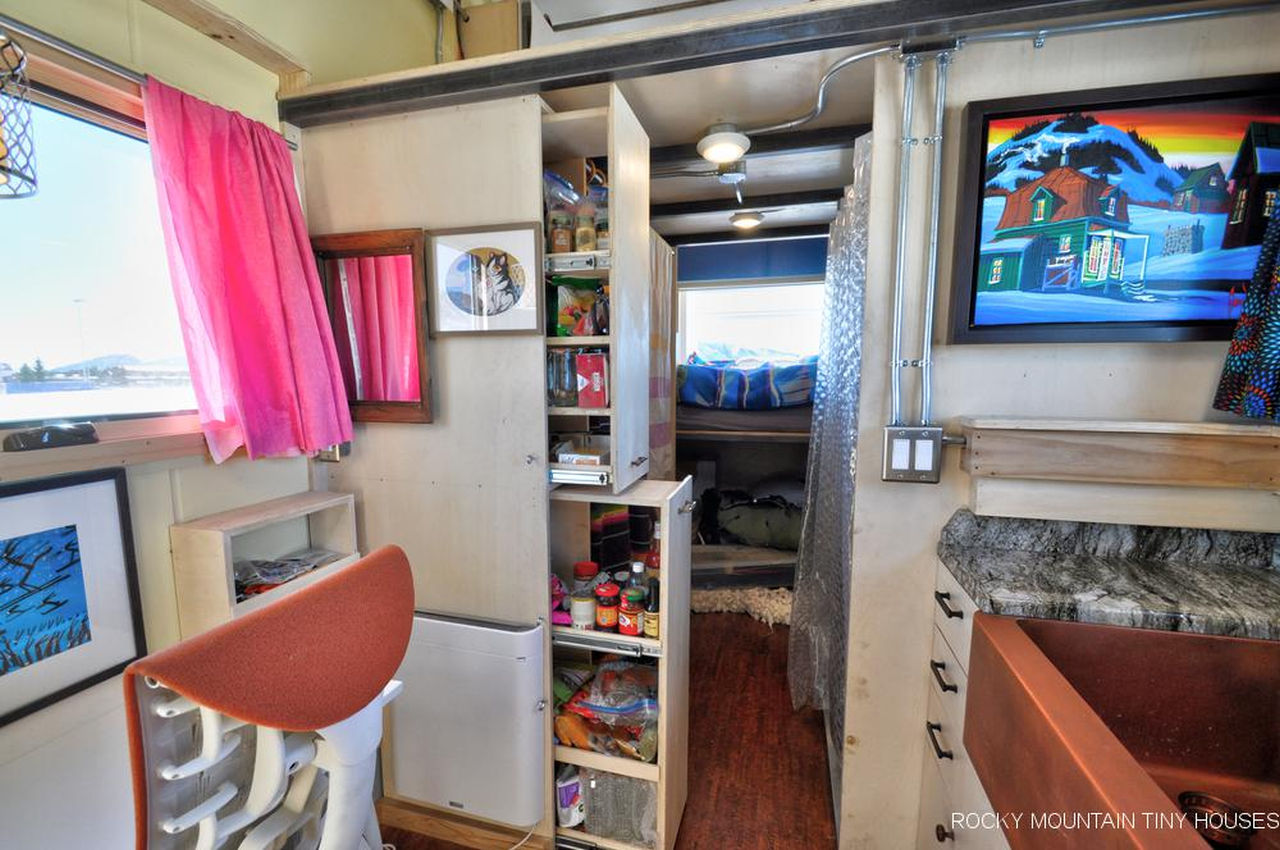 Tuscon 28′ Gooseneck Tiny House has a a pantry for aiding extra storage