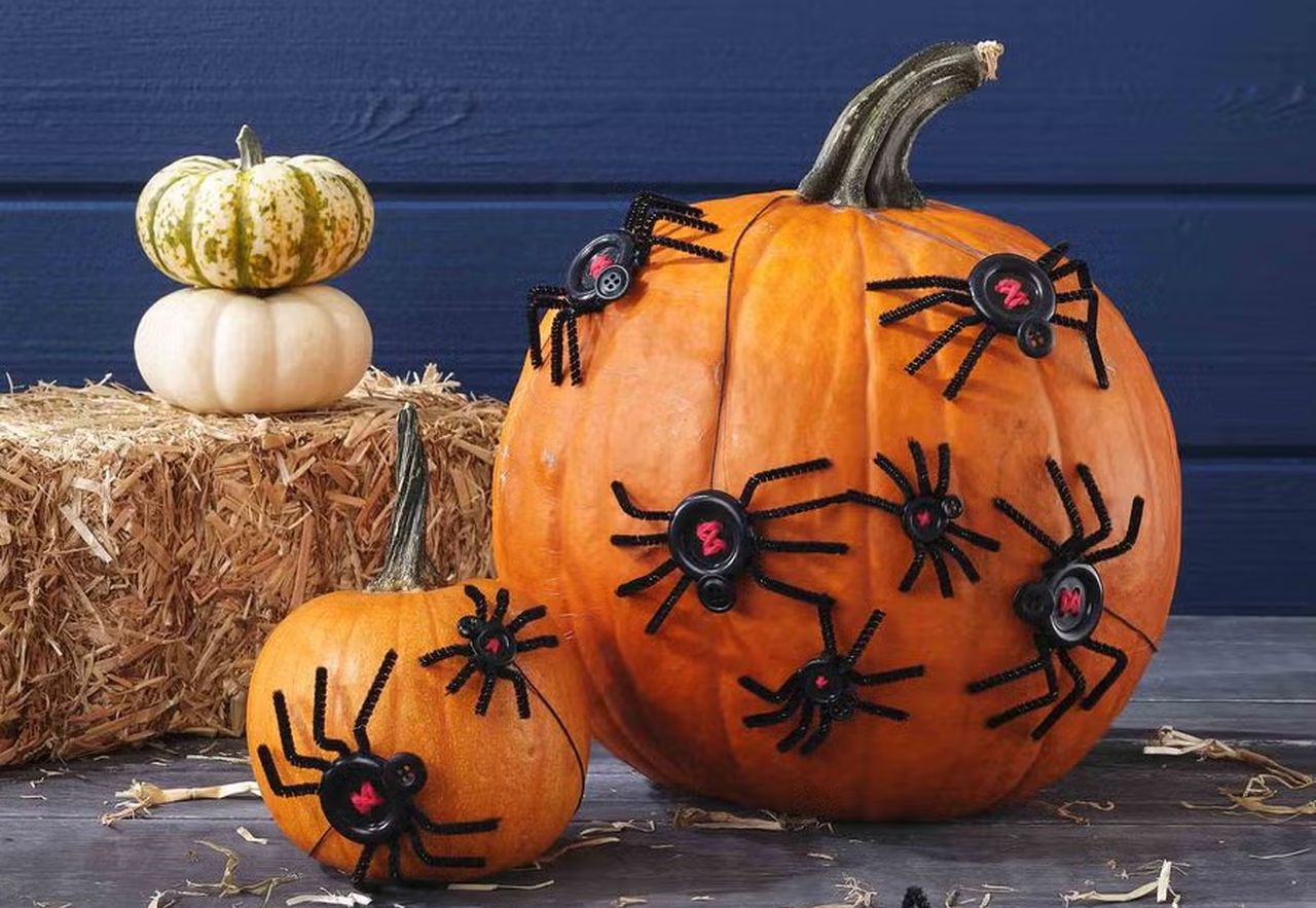 button spiders pumpkin decor